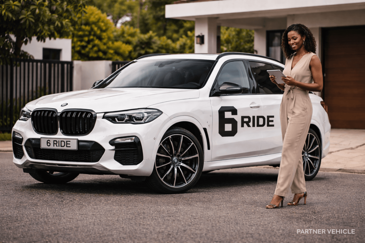 6ride partner BMW with female using tablet